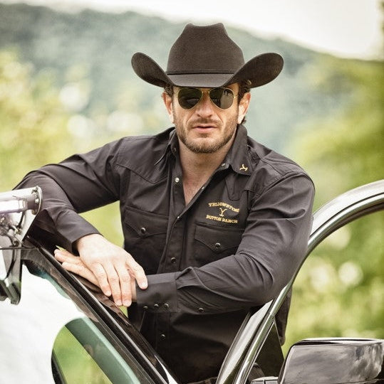 Premium Black Wool Felt Western Hat - Wyoming Collection. Make a bold statement with this exclusive black western cowboy hat. Crafted from 100% premium wool felt and featuring a distinctive hat band with rhinestone-studded buckle, the Wyoming combines classic western style with modern durability.